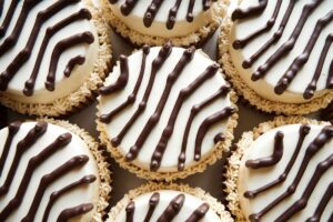 Close-up of Little Debbie Zebra Cakes with zebra-striped icing and creamy center